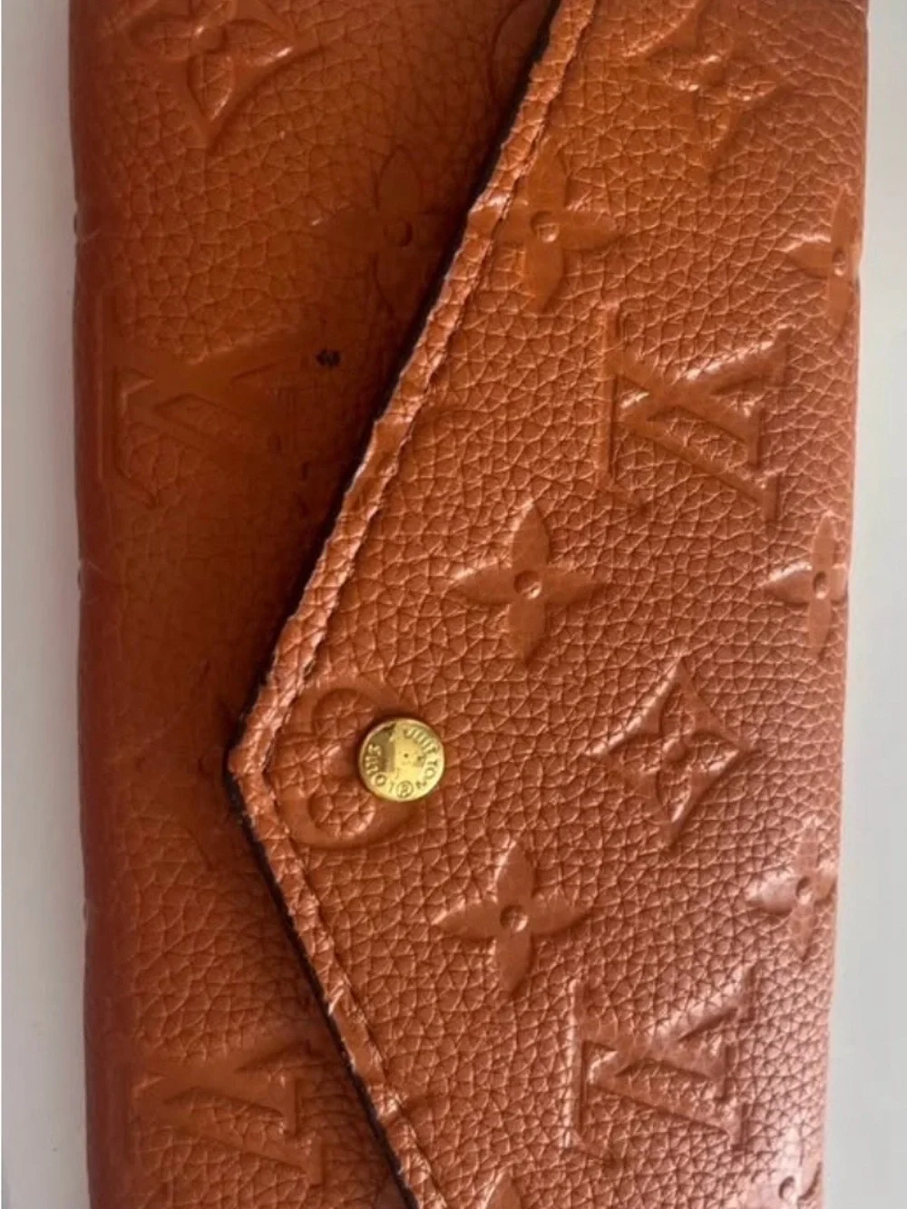 Louis Vuitton Brown Monogram Embossed Leather wallet